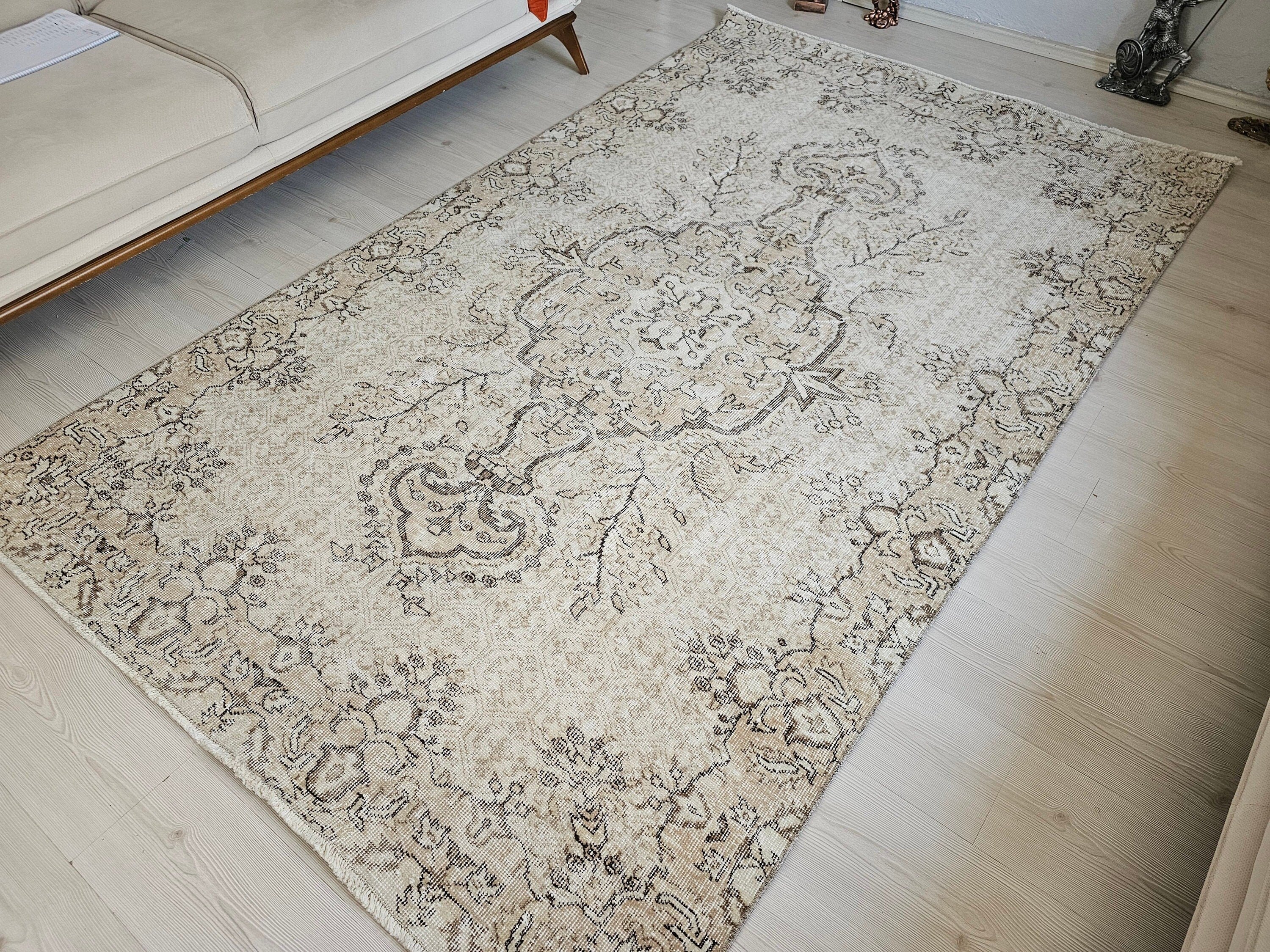 Muted Oushak Rug: 5.3x8.6 ft. Vintage Turkish Wool Area Rug