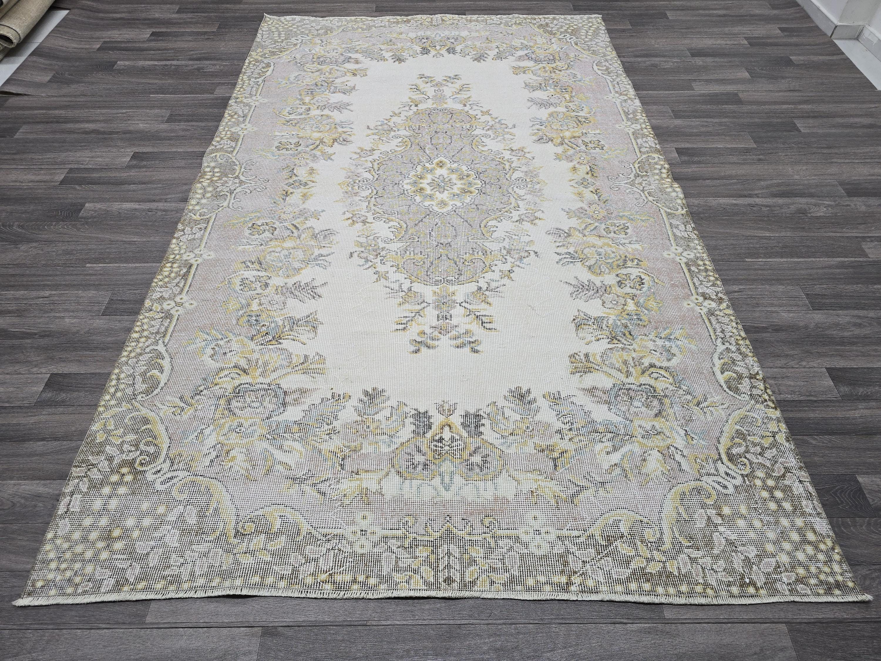 Hand Knotted Turkish Vintage Area Rug – 5.4x9 ft | Cream, Pink, Brown, Gold Accents