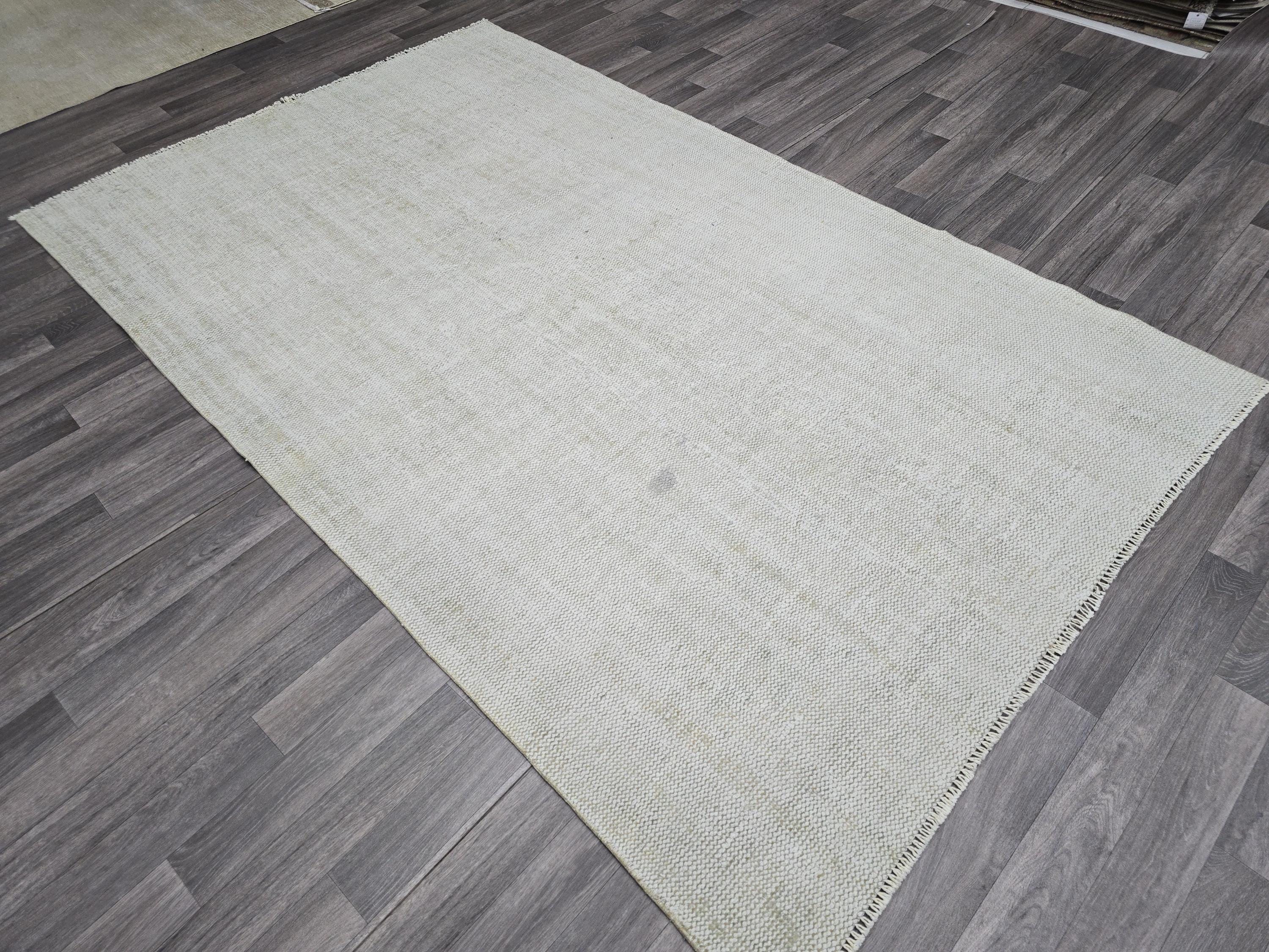 Vintage Handwoven Wool Rug: 5.4x8.6 ft Neutral Oushak Carpet
