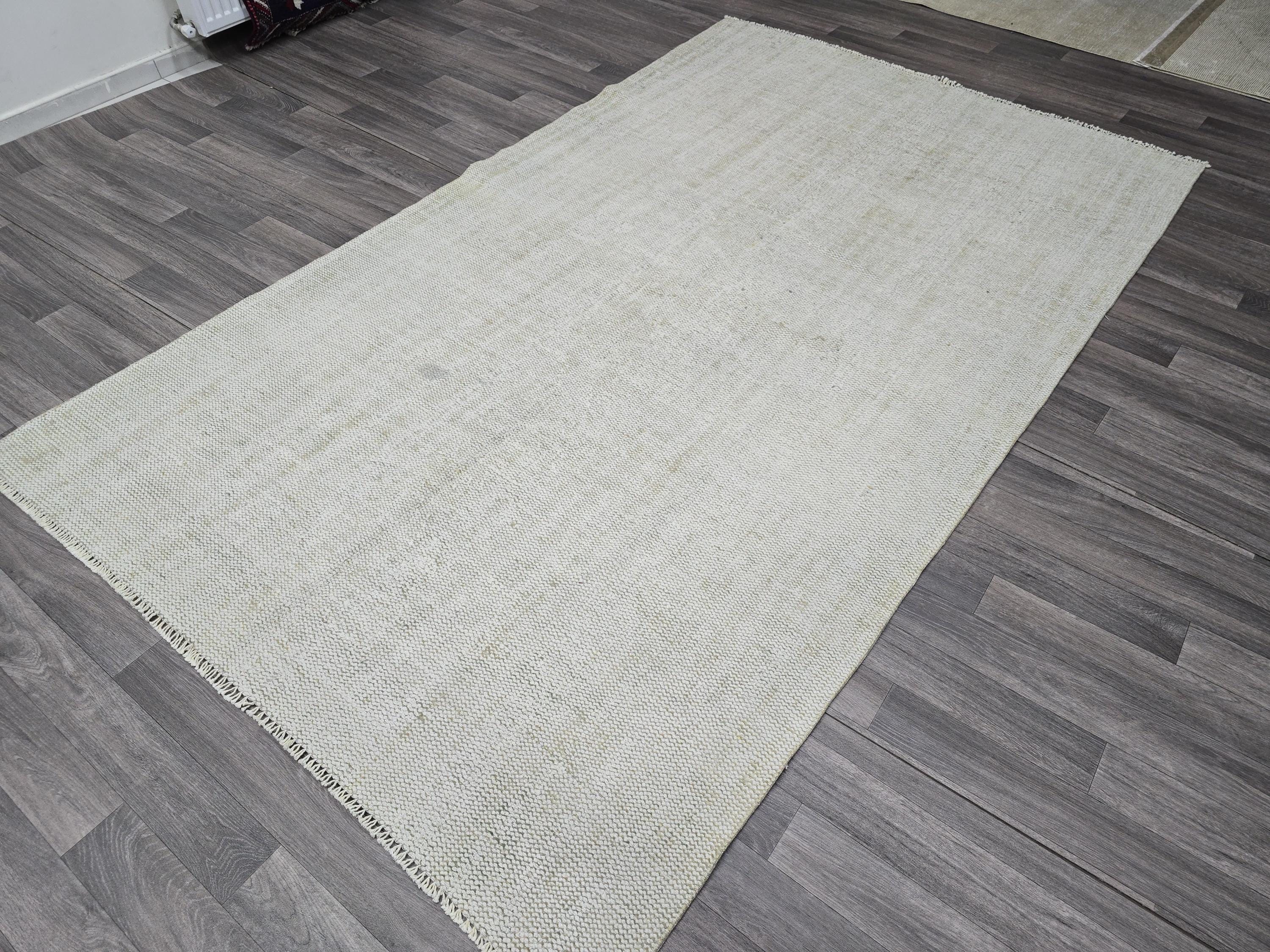 Vintage Handwoven Wool Rug: 5.4x8.6 ft Neutral Oushak Carpet