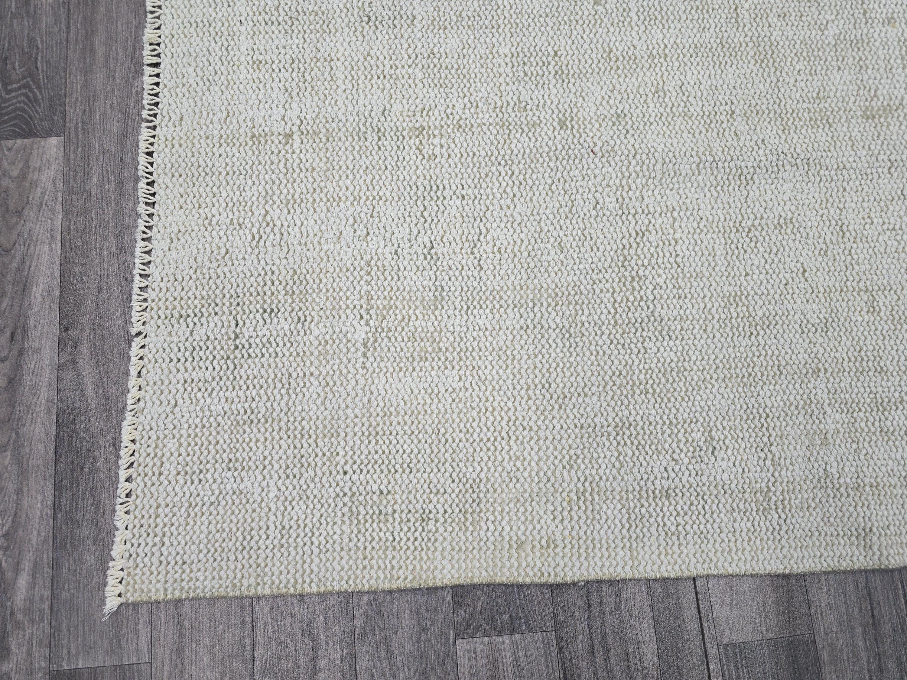 Vintage Handwoven Wool Rug: 5.4x8.6 ft Neutral Oushak Carpet