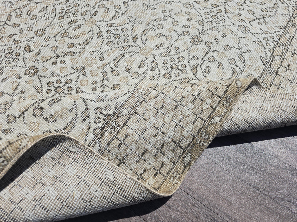 Vintage Turkish Oushak Wool Rug: 5.7x9.4 ft, Hand-Knotted Neutral Area Rug