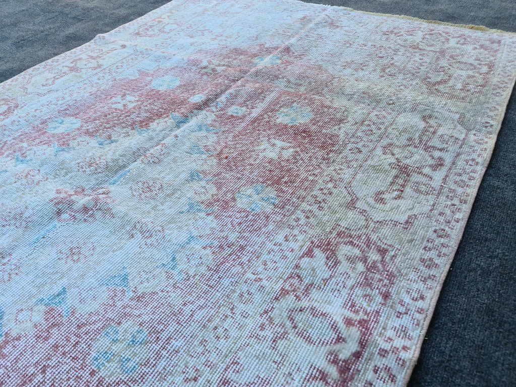 Handmade Wool Oushak Rug (4.6x8.2 ft): Faded Vintage Turkish Accent Rug