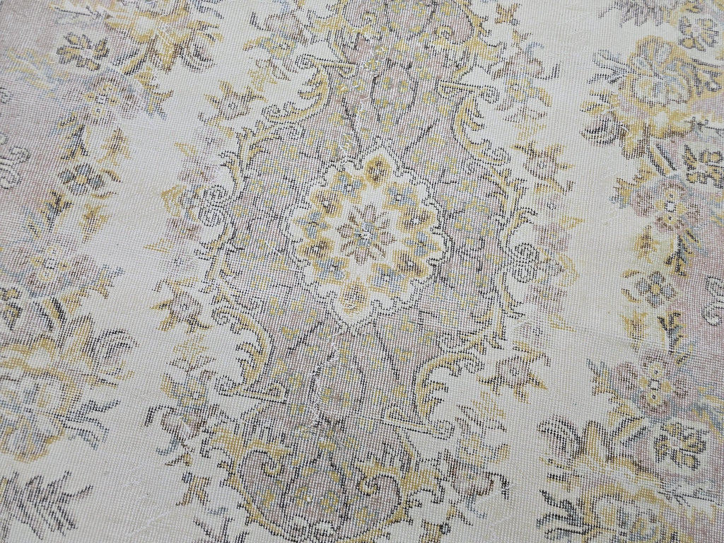 Hand Knotted Turkish Vintage Area Rug – 5.4x9 ft | Cream, Pink, Brown, Gold Accents
