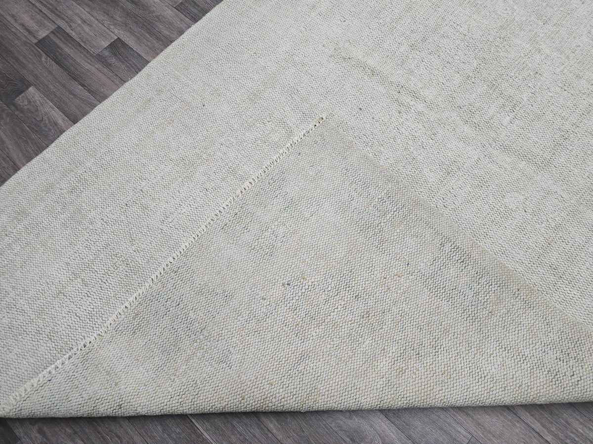 Vintage Handwoven Wool Rug: 5.4x8.6 ft Neutral Oushak Carpet