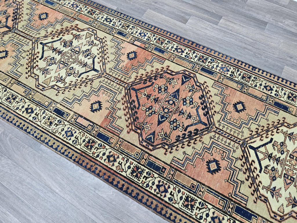 Vintage Heriz Wool Runner: Hand-Knotted Pastel Oushak Rug (3.40x13.30 ft)