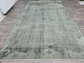Vintage Turkish Overdyed Rug: Mint Green Distressed Bohemian Carpet (6.7x10.8 ft)