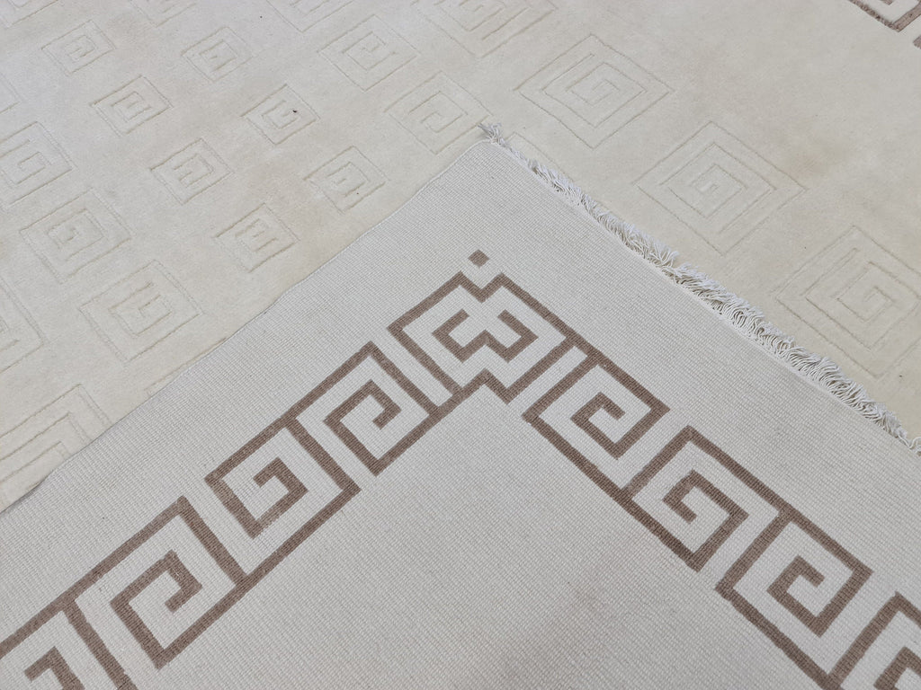 Cream Hand-Knotted Wool Area Rug: 6.82x9.35 ft, Vintage Boho Rug
