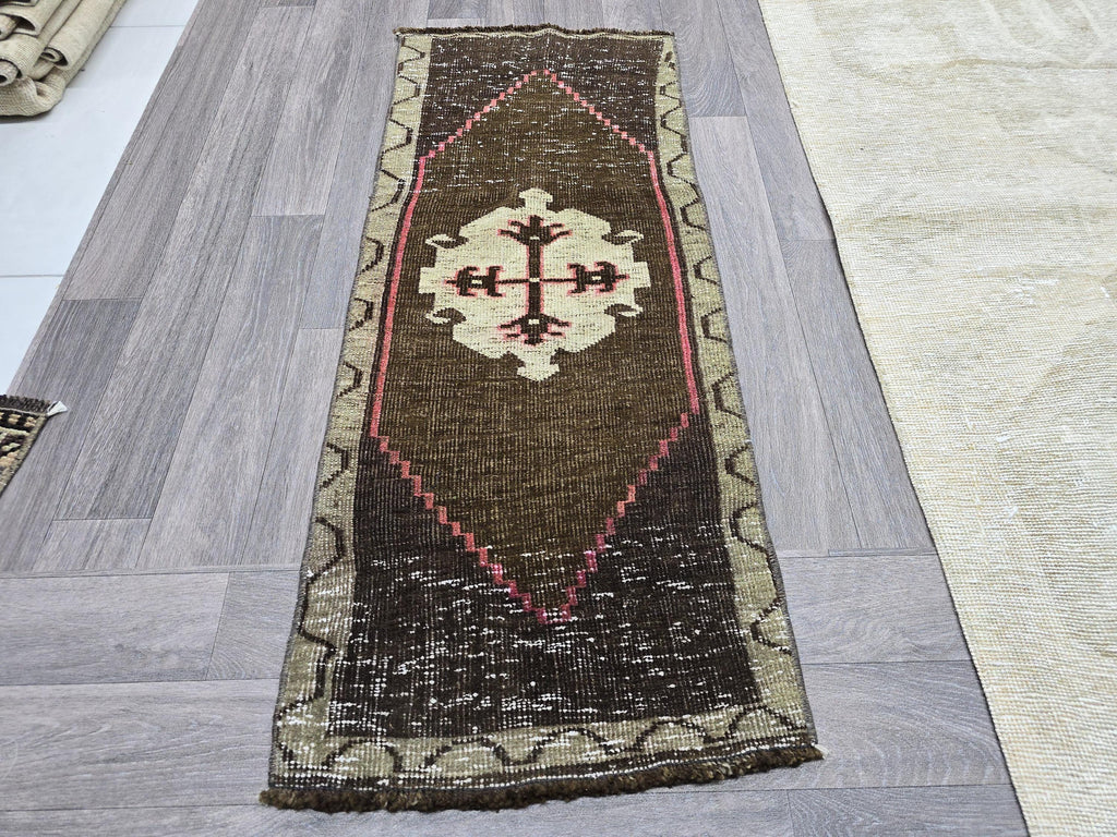 Vintage Hand-Knotted Turkish Wool Rug: Brown Tribal Medallion Entry Mat (1x3 ft)