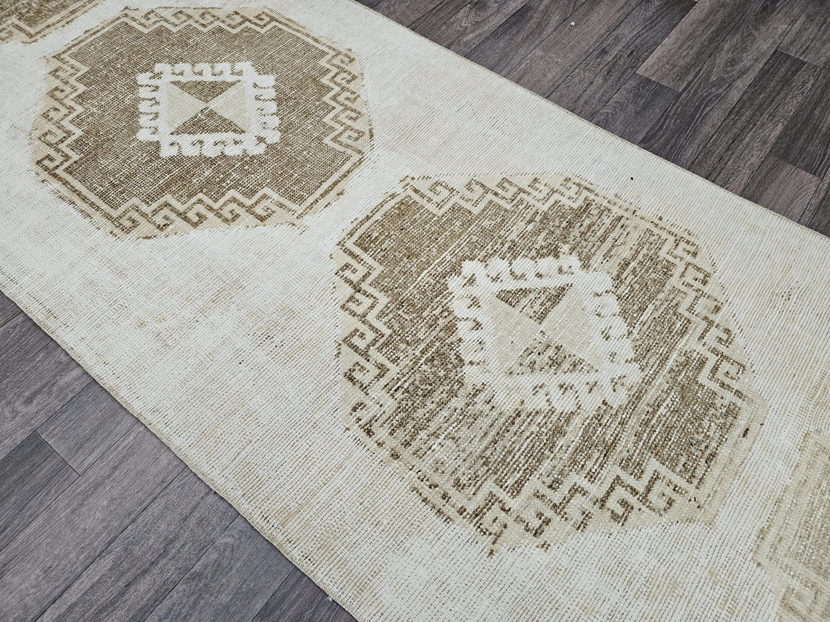 Vintage Hand-Knotted Wool Runner Rug: 3x10.5 ft Beige Brown Oriental