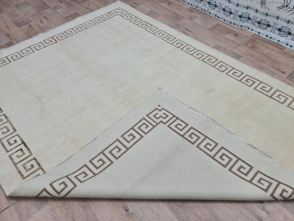 Cream Hand-Knotted Wool Area Rug: 6.82x9.35 ft, Vintage Boho Rug