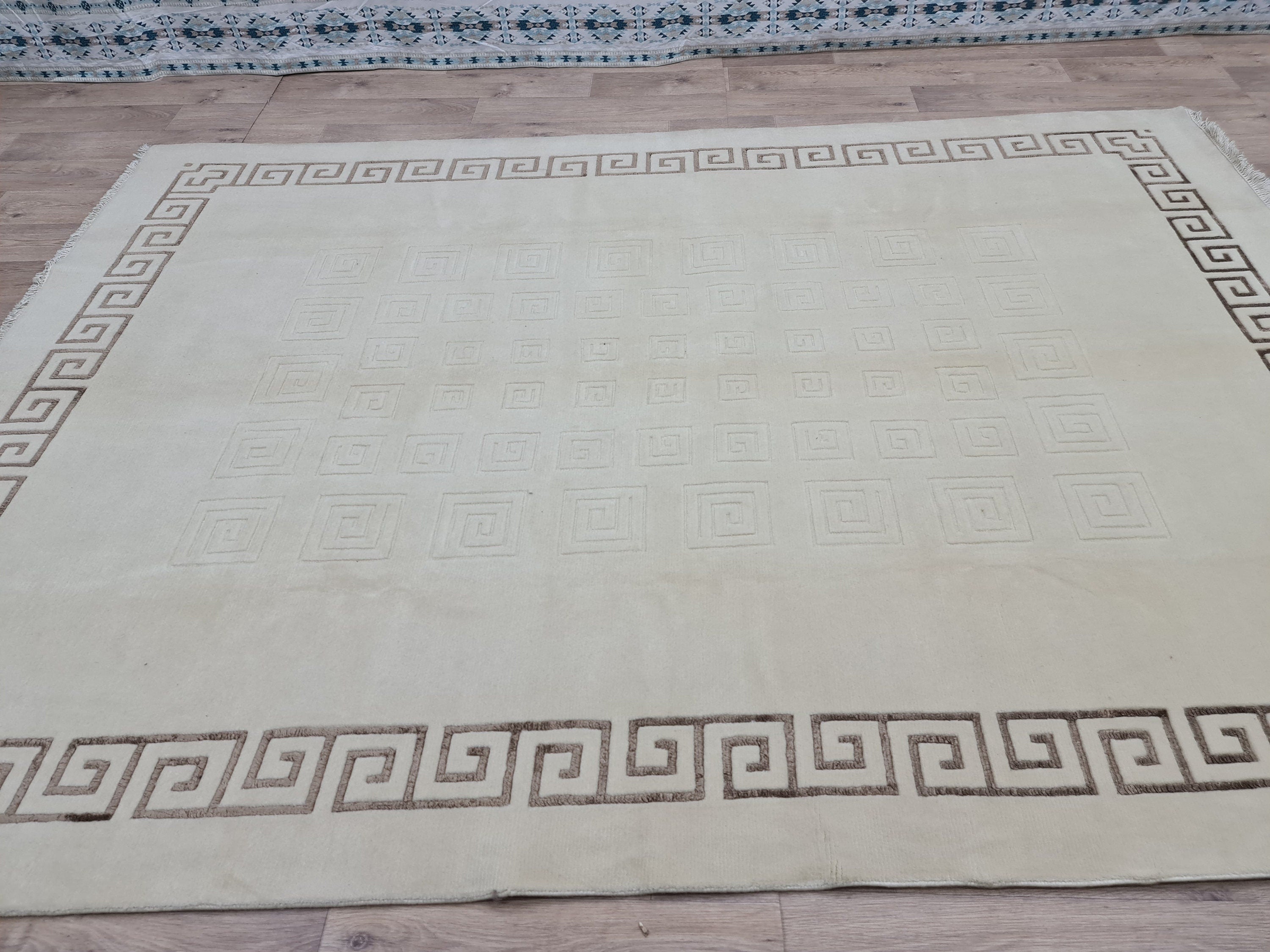 Cream Hand-Knotted Wool Area Rug: 6.82x9.35 ft, Vintage Boho Rug