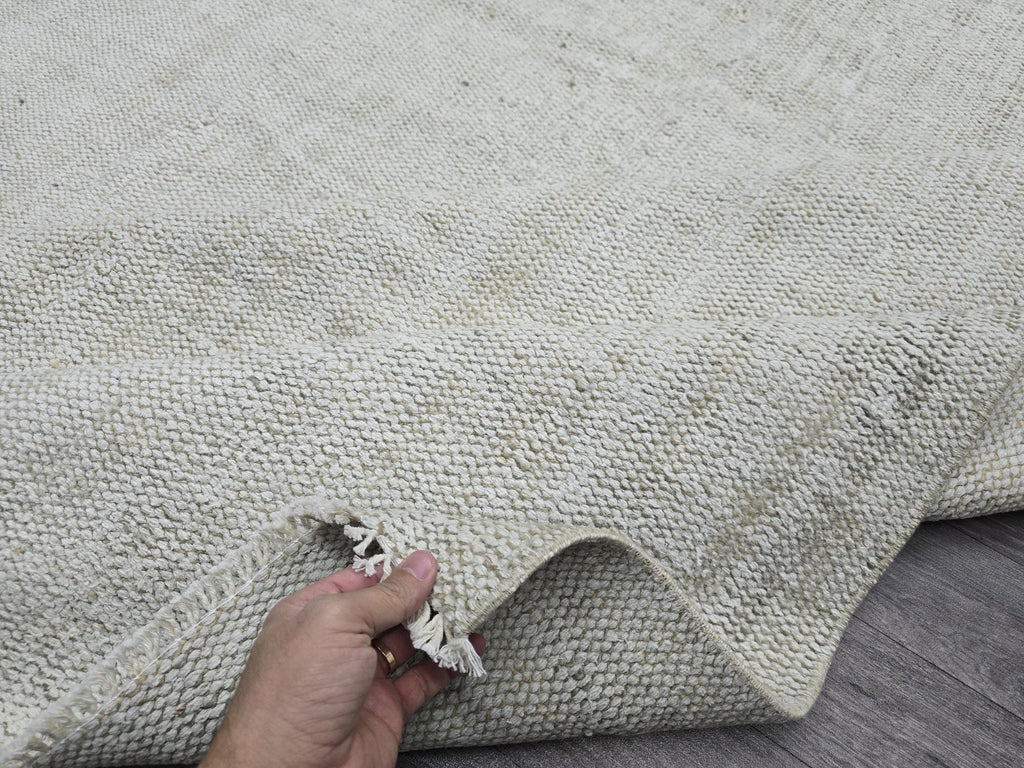Vintage Handwoven Wool Rug: 5.4x8.6 ft Neutral Oushak Carpet