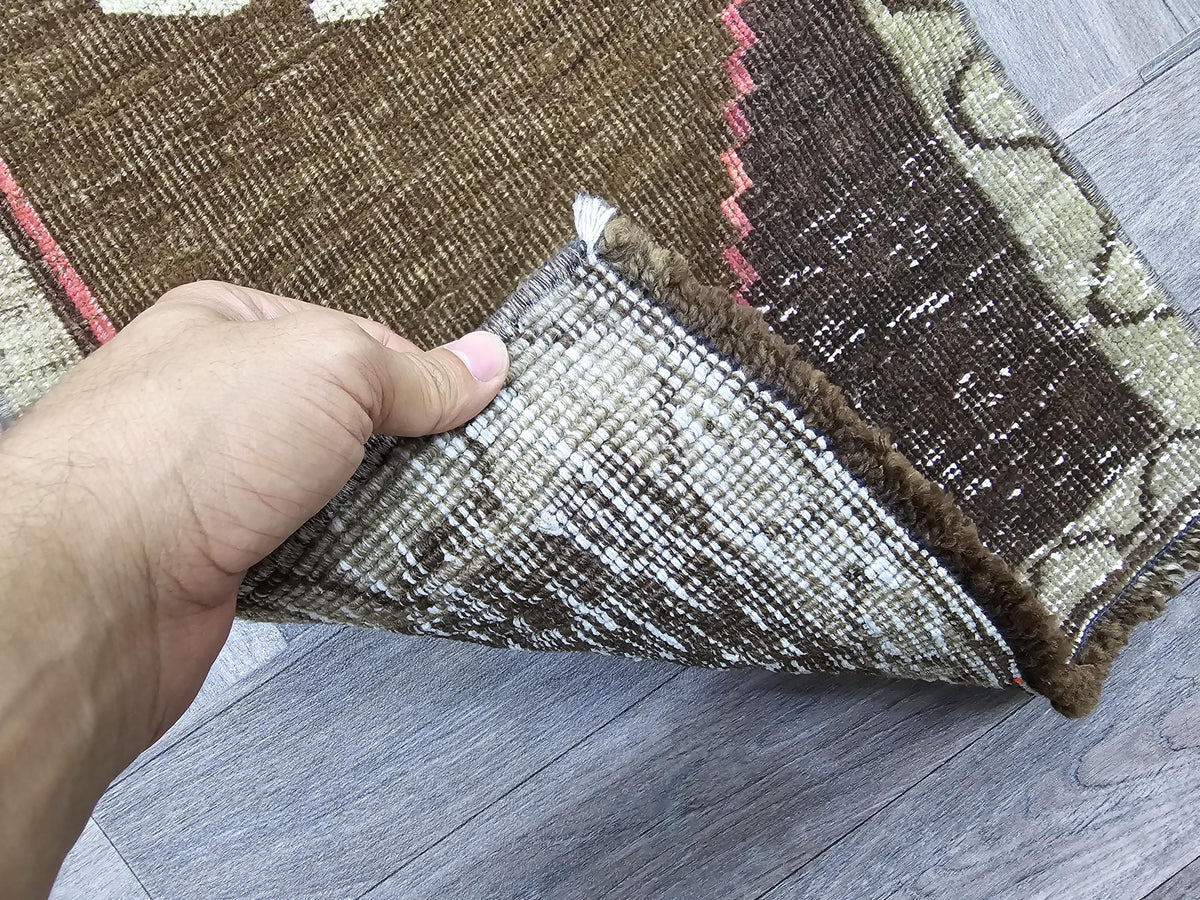 Vintage Hand-Knotted Turkish Wool Rug: Brown Tribal Medallion Entry Mat (1x3 ft)
