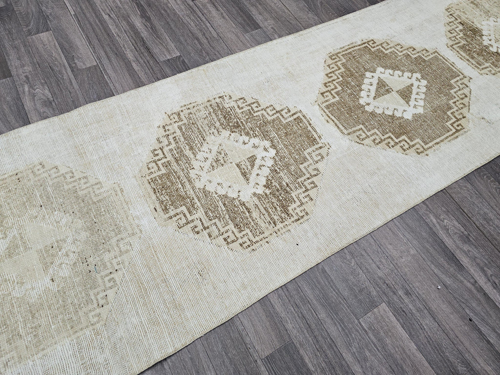 Vintage Hand-Knotted Wool Runner Rug: 3x10.5 ft Beige Brown Oriental