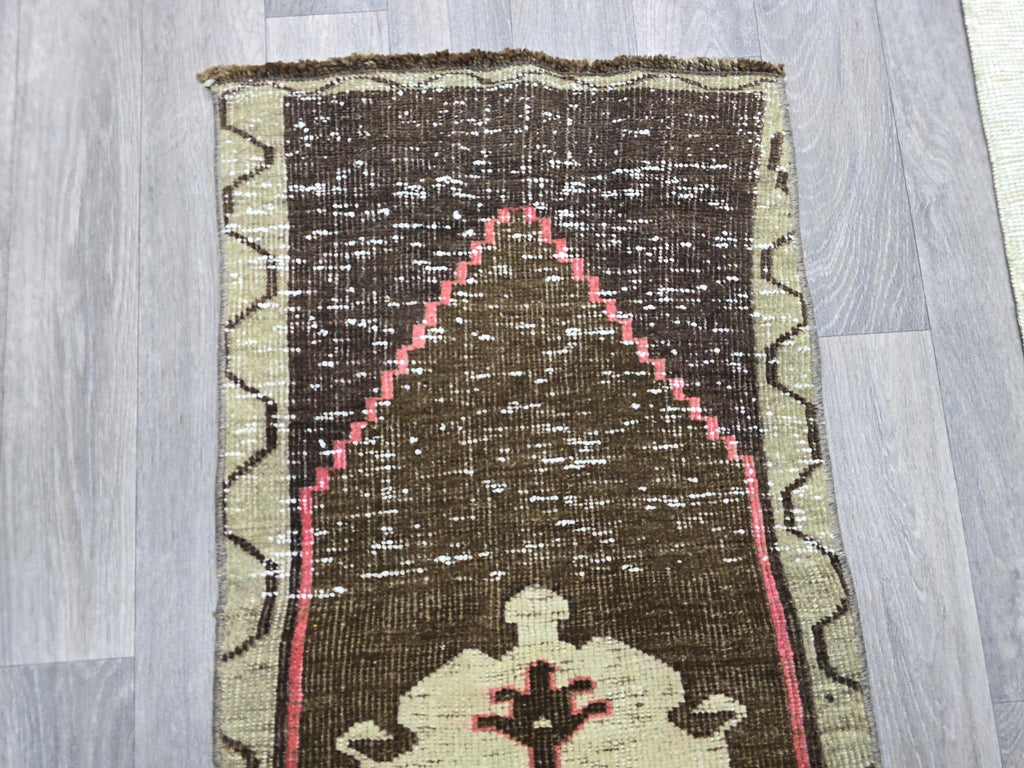 Vintage Hand-Knotted Turkish Wool Rug: Brown Tribal Medallion Entry Mat (1x3 ft)