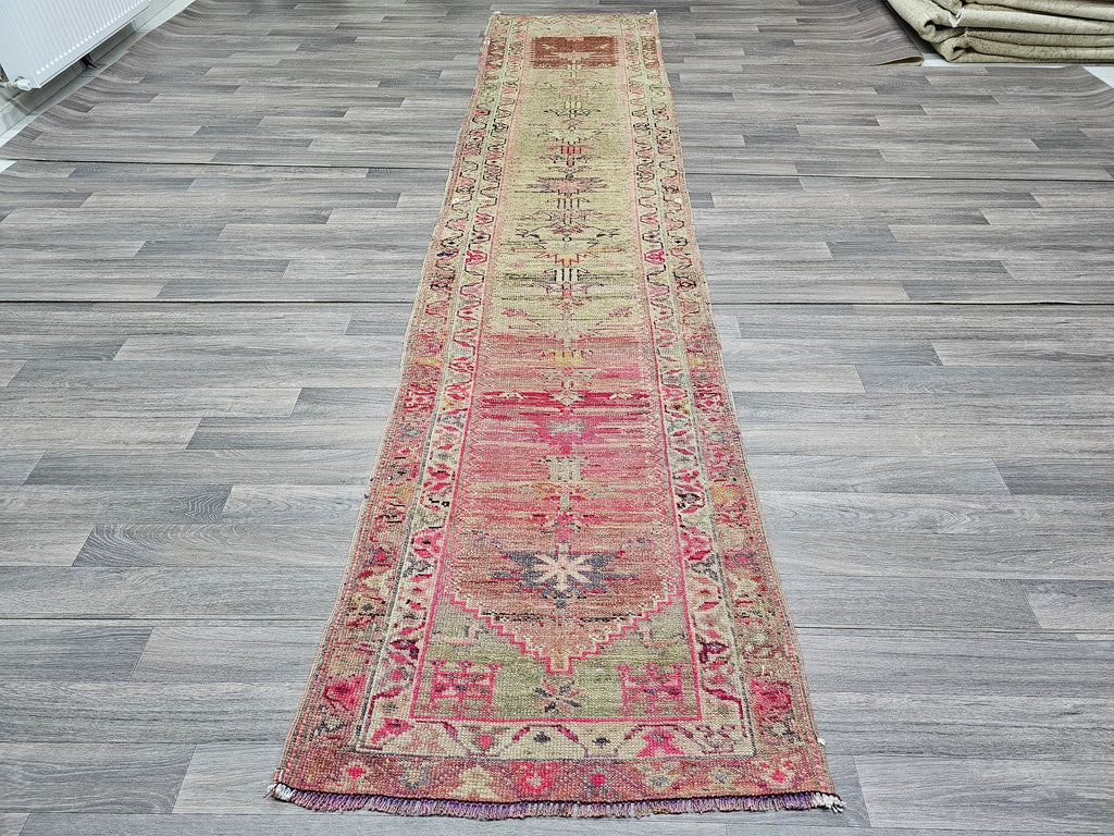 Antique Turkish Wool Runner Rug: Muted Pastel Herki Hallway Rug