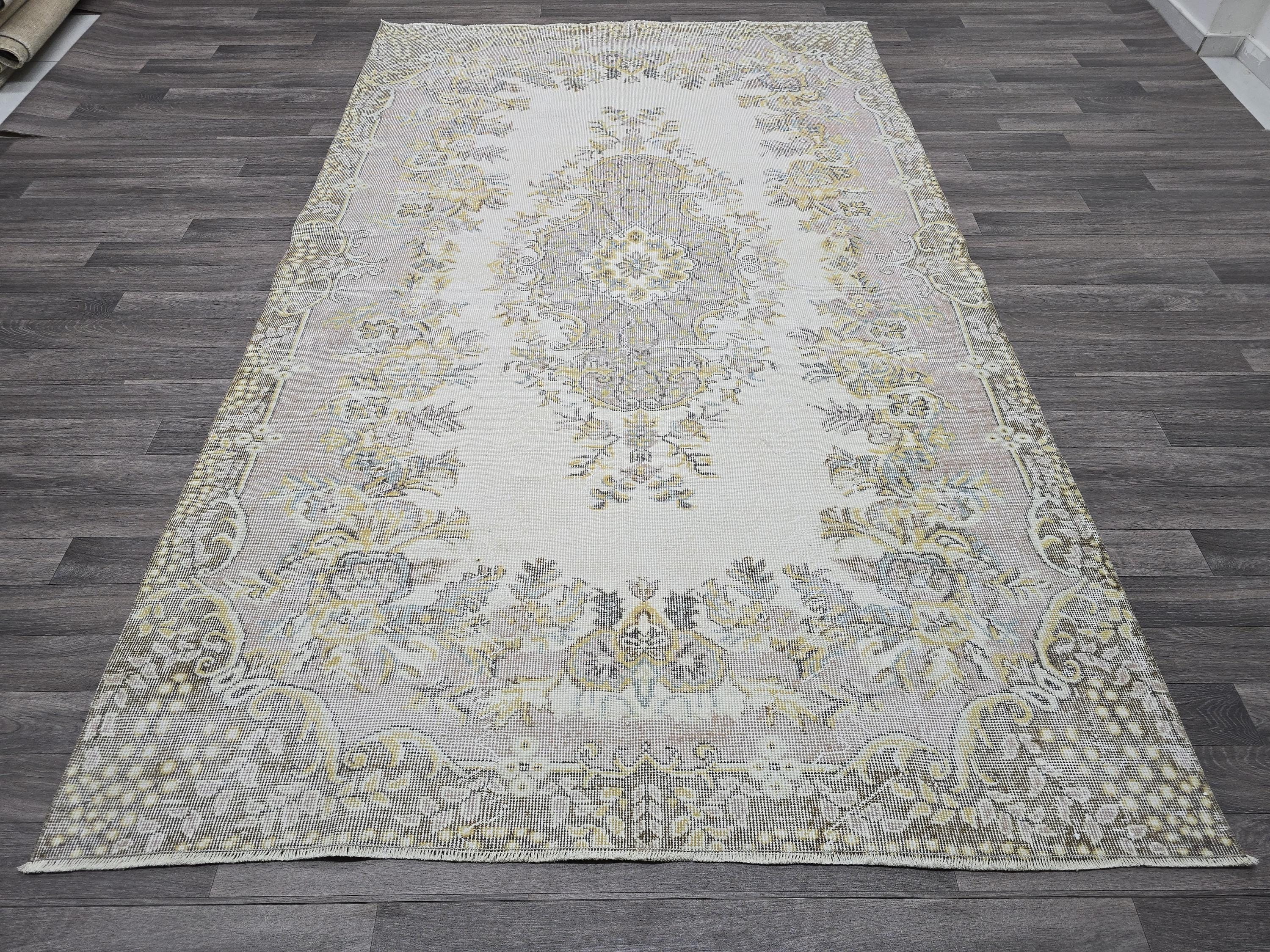 Hand Knotted Turkish Vintage Area Rug – 5.4x9 ft | Cream, Pink, Brown, Gold Accents