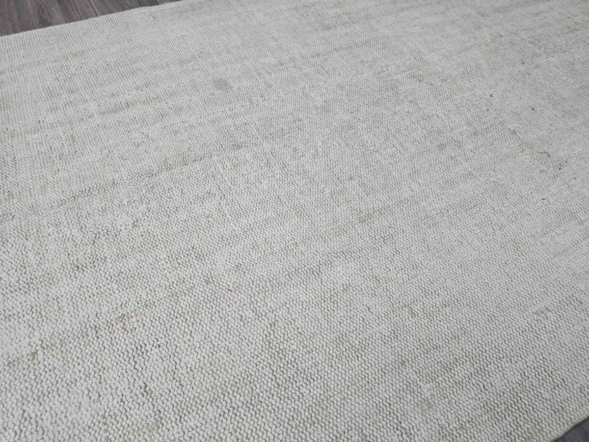 Vintage Handwoven Wool Rug: 5.4x8.6 ft Neutral Oushak Carpet