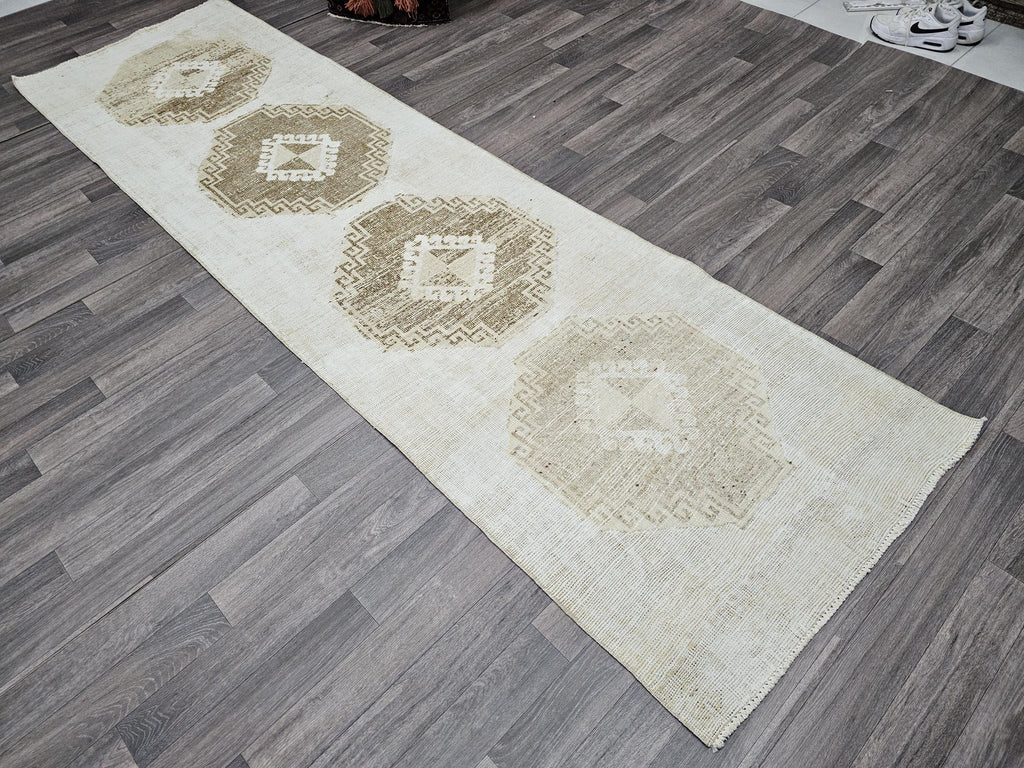 Vintage Hand-Knotted Wool Runner Rug: 3x10.5 ft Beige Brown Oriental