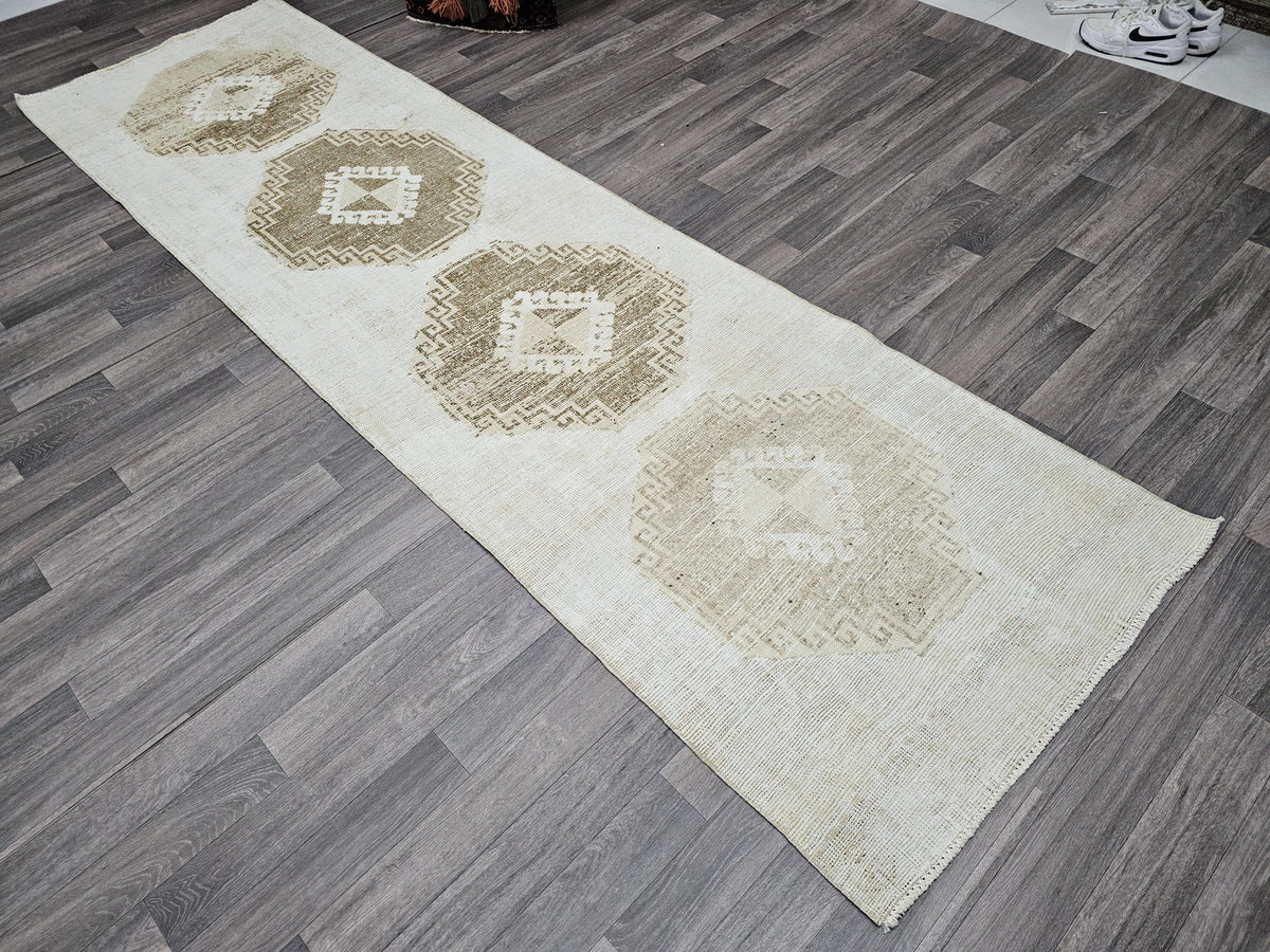 Vintage Hand-Knotted Wool Runner Rug: 3x10.5 ft Beige Brown Oriental