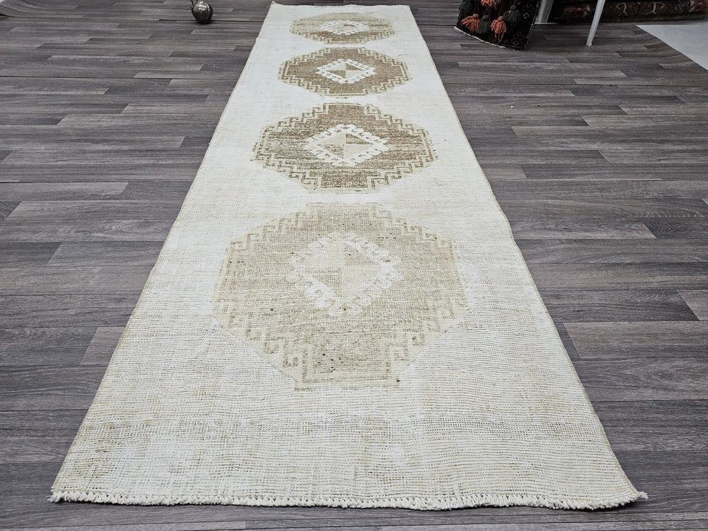 Vintage Hand-Knotted Wool Runner Rug: 3x10.5 ft Beige Brown Oriental
