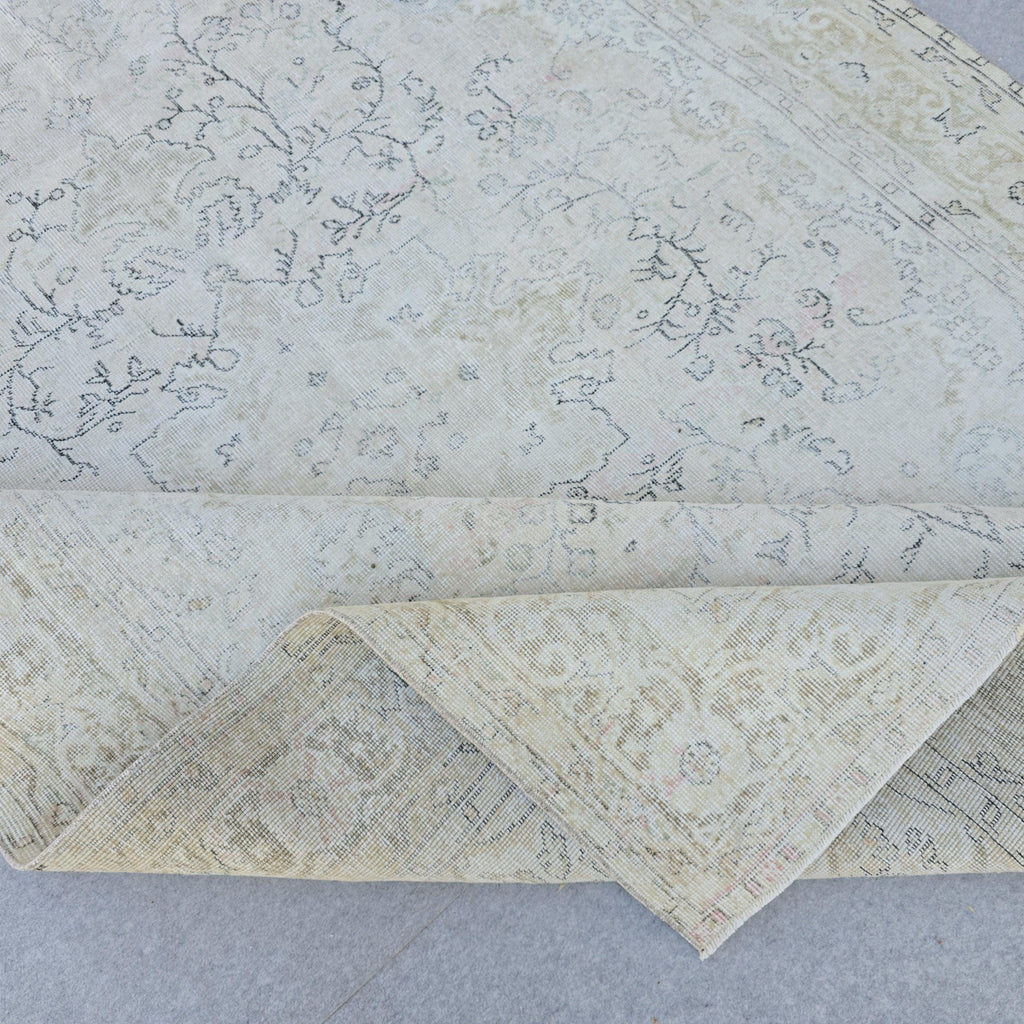 Vintage Hand-Knotted Turkish Oushak Rug: 7x10 Faded Area Rug