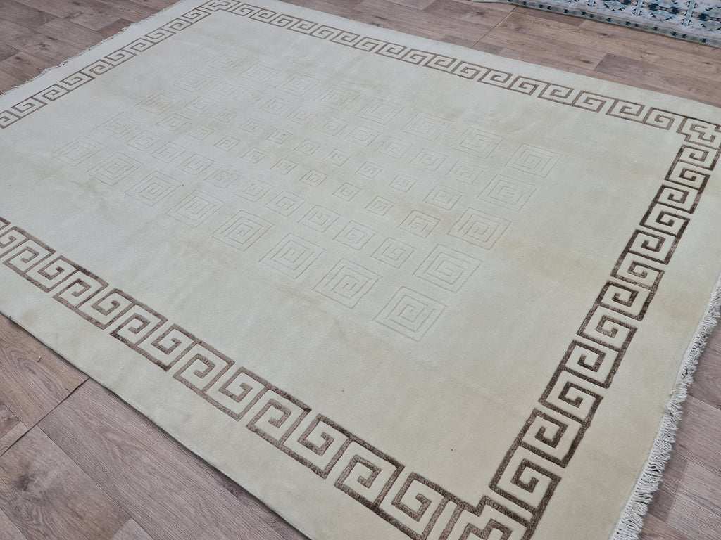 Cream Hand-Knotted Wool Area Rug: 6.82x9.35 ft, Vintage Boho Rug