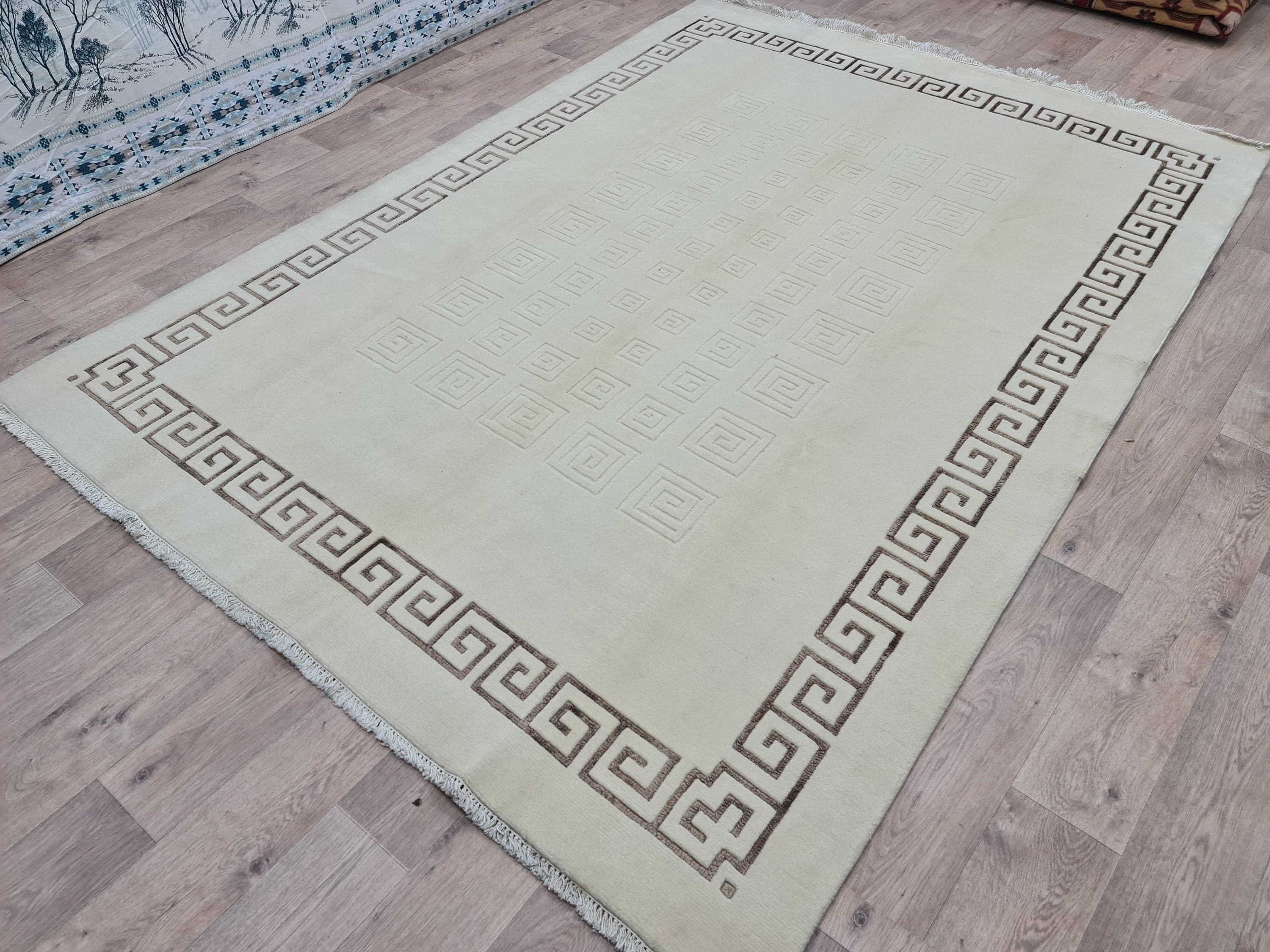 Cream Hand-Knotted Wool Area Rug: 6.82x9.35 ft, Vintage Boho Rug