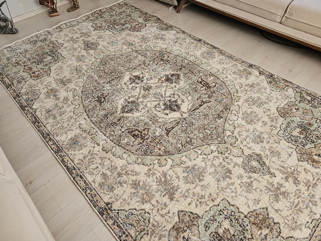 Hand-Knotted Wool Oushak Rug: 6x9 Vintage Turkish Area Rug