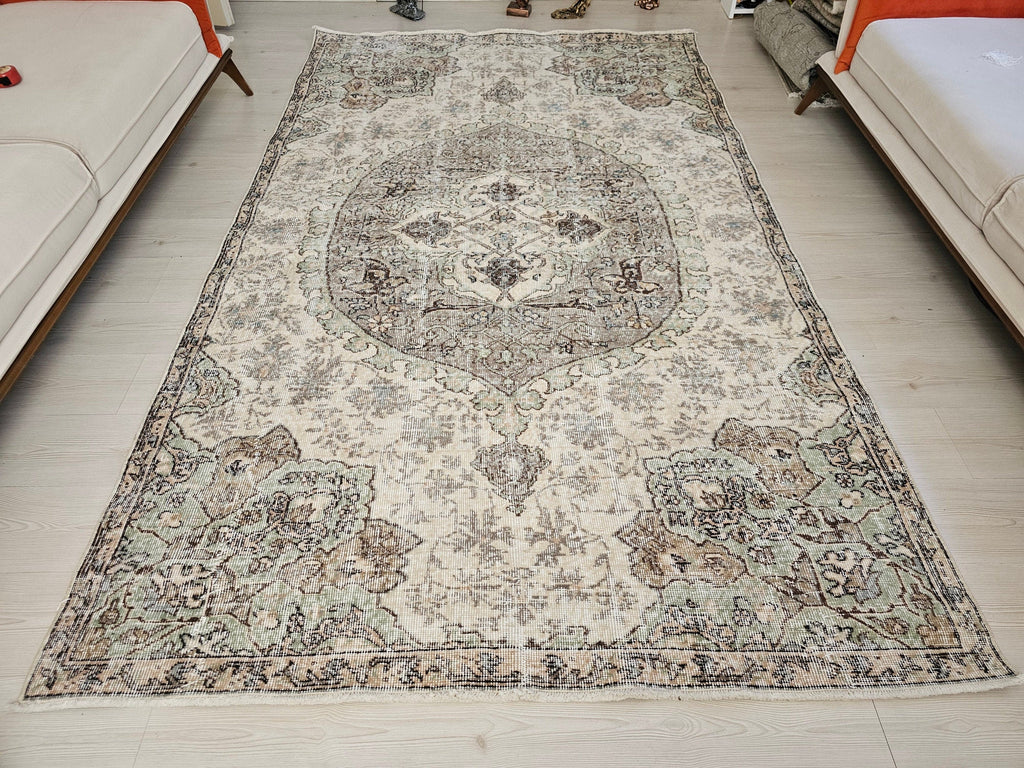 Hand-Knotted Wool Oushak Rug: 6x9 Vintage Turkish Area Rug