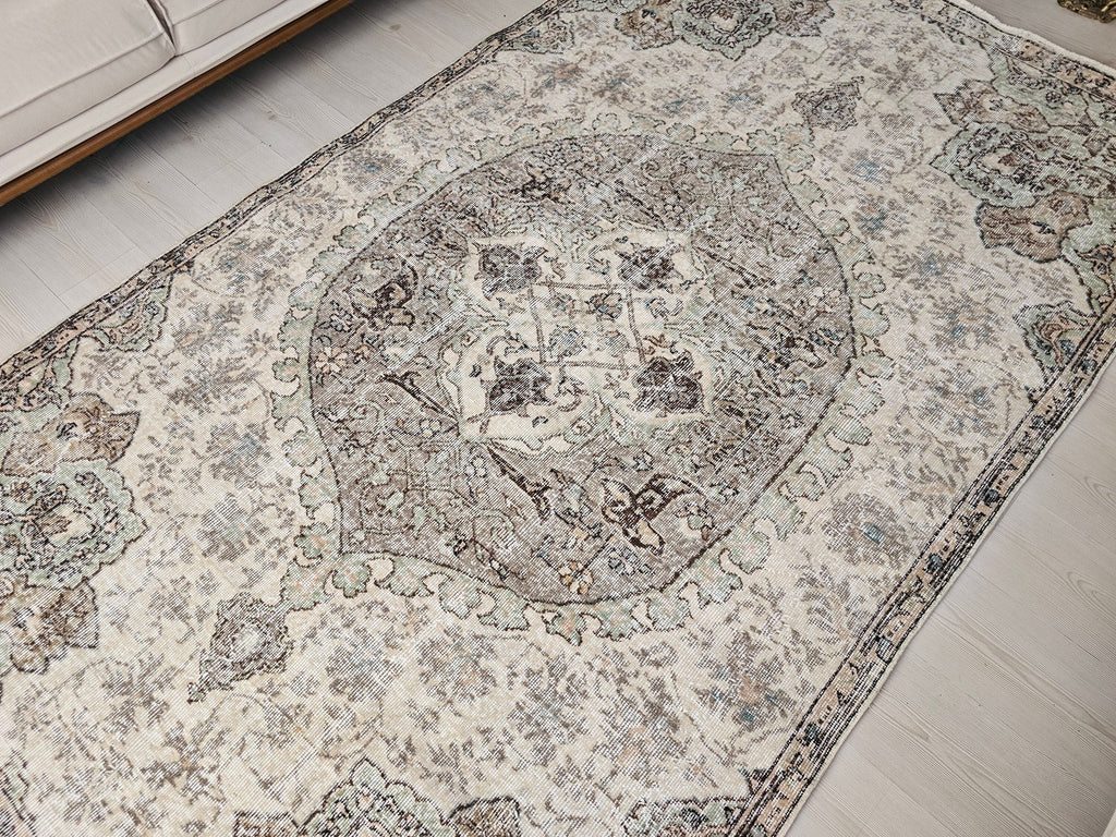 Hand-Knotted Wool Oushak Rug: 6x9 Vintage Turkish Area Rug