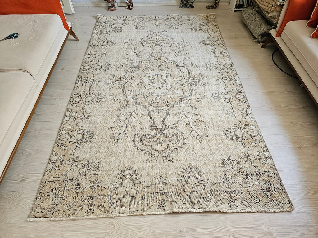 Muted Oushak Rug: 5.3x8.6 ft. Vintage Turkish Wool Area Rug