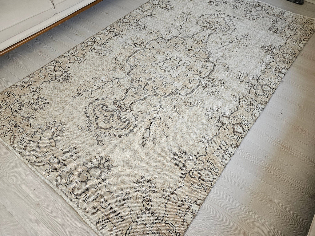 Muted Oushak Rug: 5.3x8.6 ft. Vintage Turkish Wool Area Rug