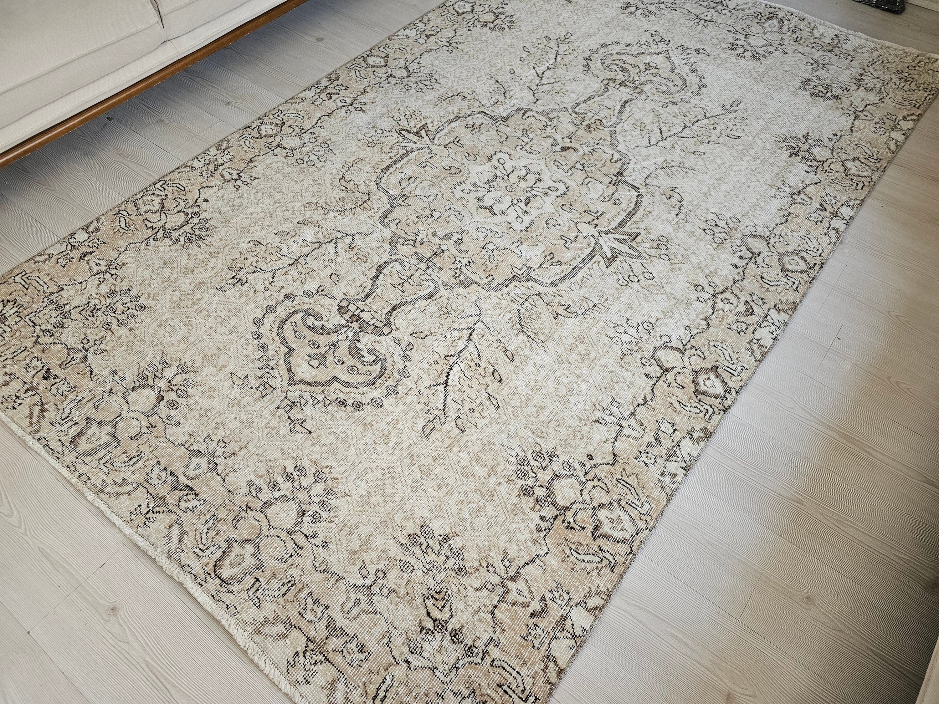 Muted Oushak Rug: 5.3x8.6 ft. Vintage Turkish Wool Area Rug