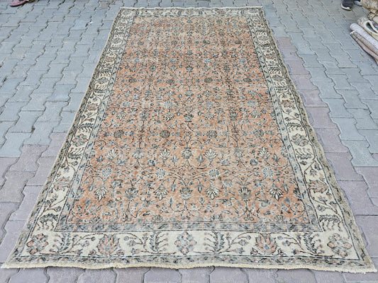 5x9 Vintage Anatolian Handwoven Rug with Floral Design