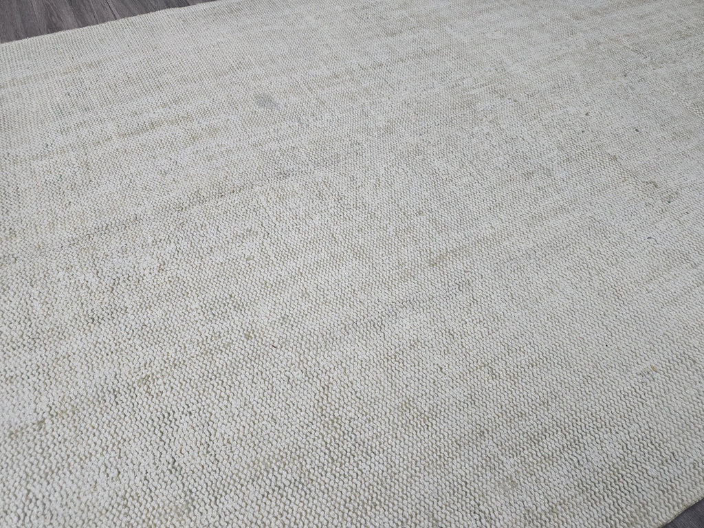 Vintage Handwoven Wool Rug: 5.4x8.6 ft Neutral Oushak Carpet