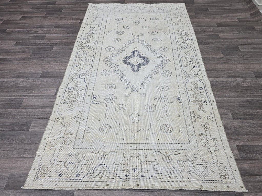 Vintage Turkish Oushak Rug: 4.3x7.7ft Hand-Knotted Wool Rug