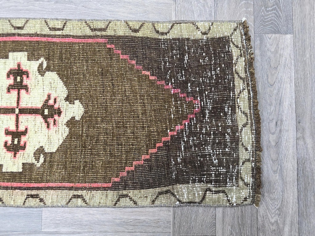 Vintage Hand-Knotted Turkish Wool Rug: Brown Tribal Medallion Entry Mat (1x3 ft)