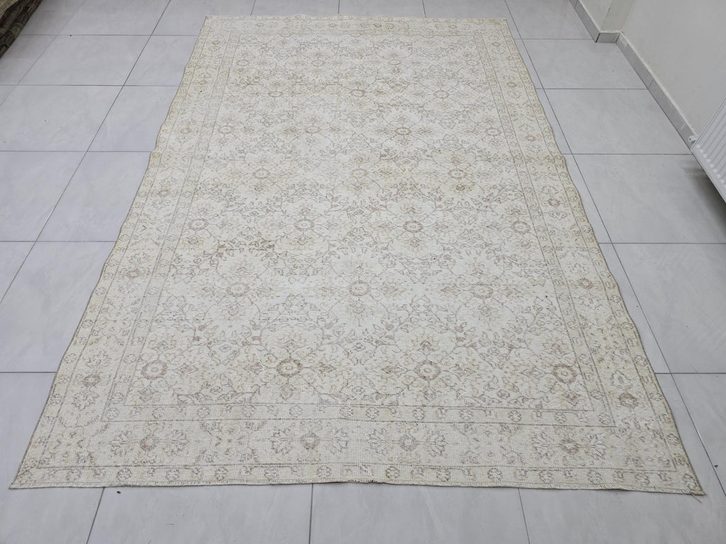 Hand-Knotted Wool Oushak Rug 7x10: Cream Beige Vintage Turkish Rug
